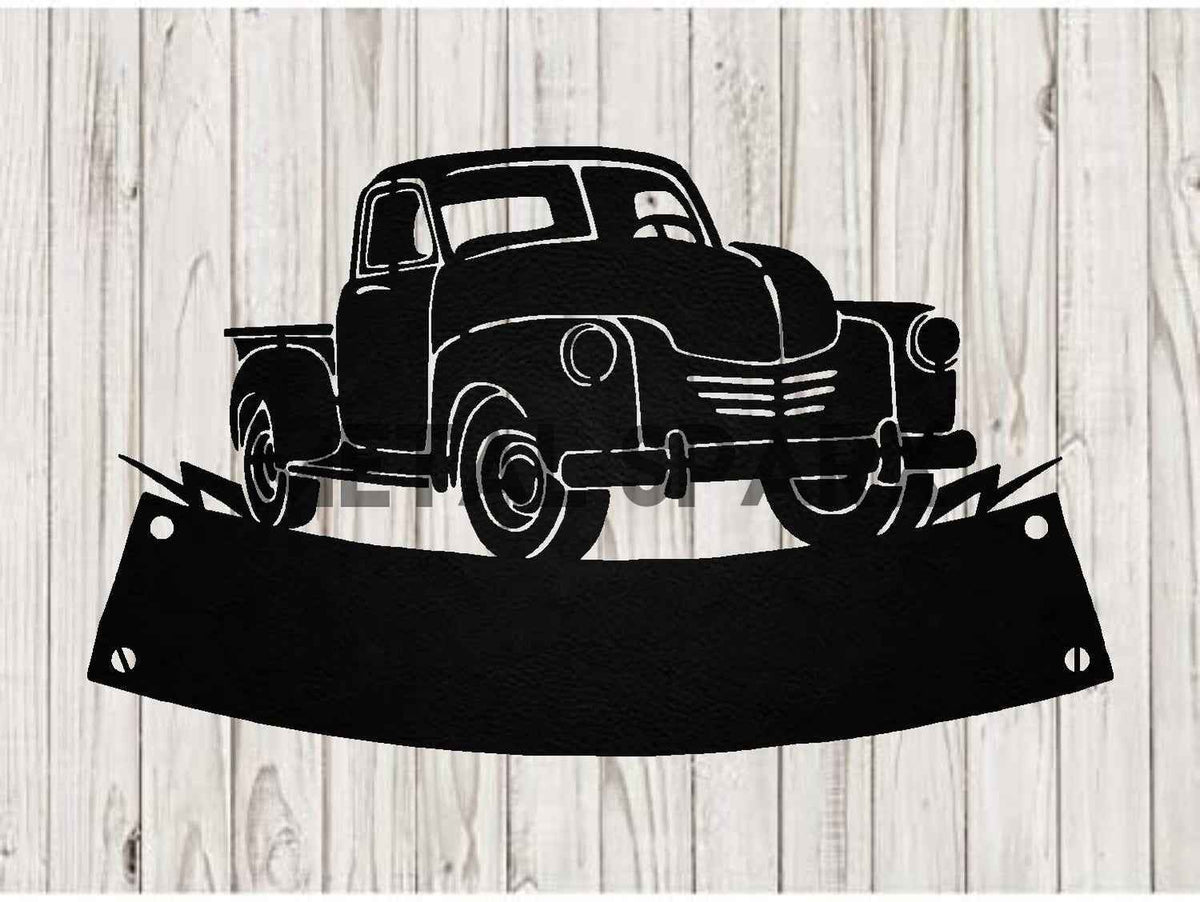 Black metal pickup truck monogram art by Metal Sparx, featuring a sleek, modern design perfect for vehicle or wall decor.