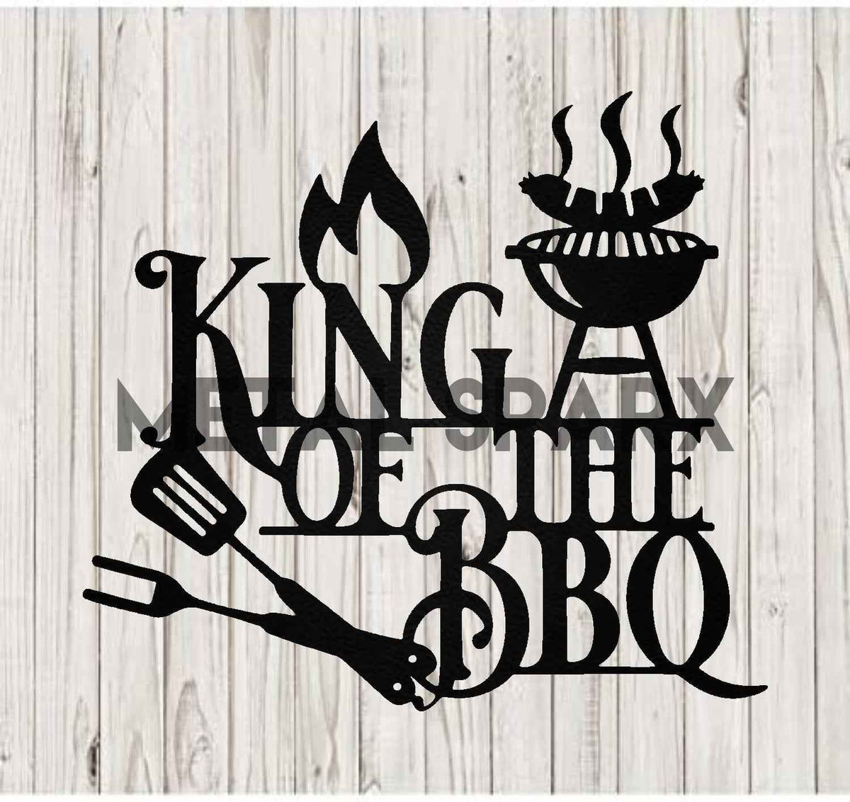 Black King of the BBQ grill tool by Metal Sparx, featuring a sturdy handle and grilling accessories.