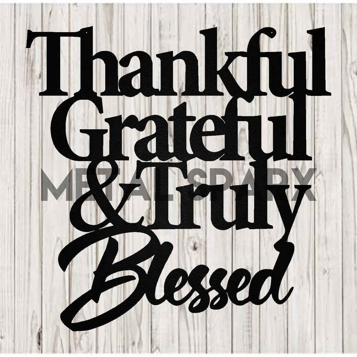 Black metal art piece with "Thankful, Grateful" inscription by Metal Sparx, featuring elegant, handcrafted metal lettering.