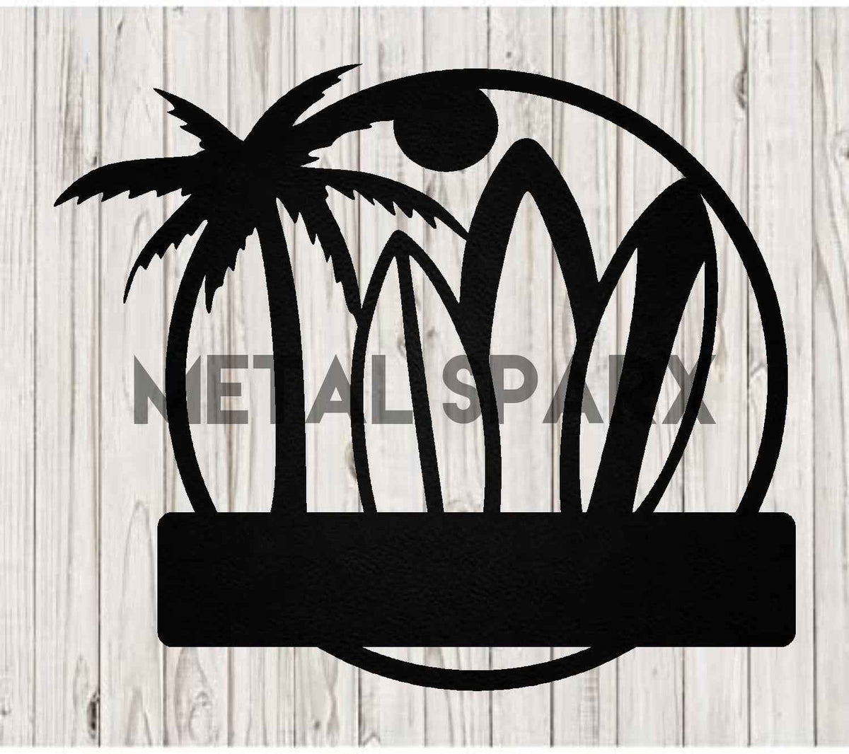 Black Metal Sparx surfboard lying on the sand, showcasing its sleek design and durable construction for riding waves.