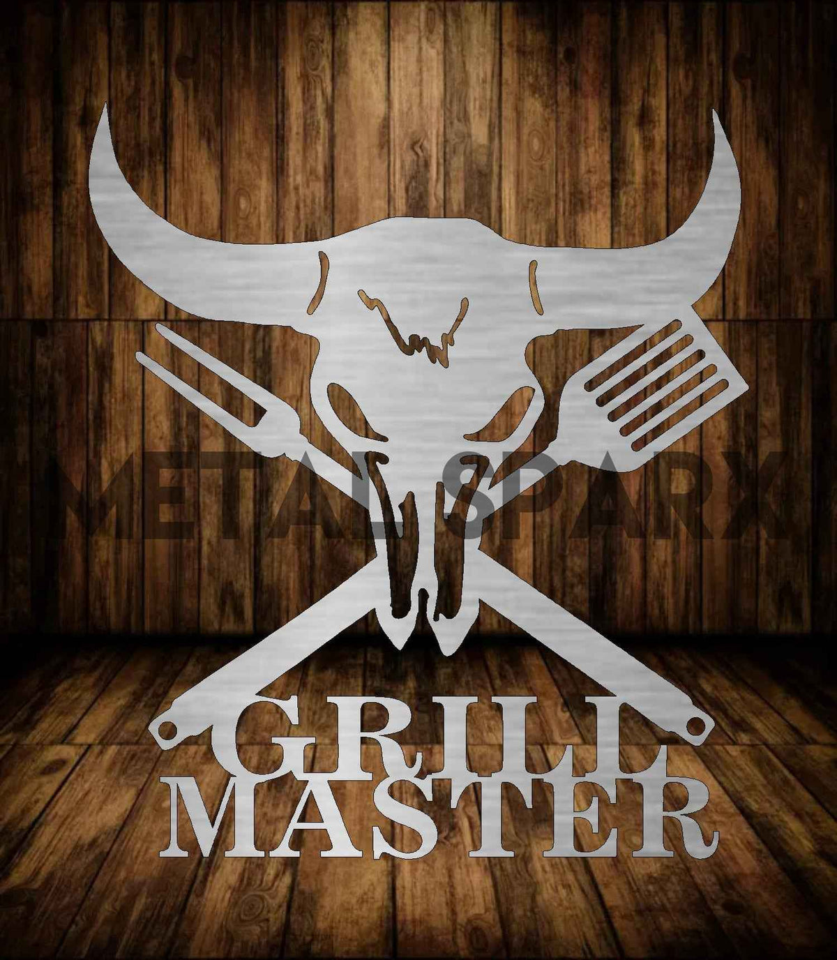 Metal Sparx Grill Master barbecue grill tools set with spatula, tongs, and fork on a wooden table for outdoor grilling.