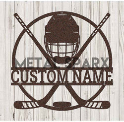 Metal Sparx hockey stick with copper finish, featuring a sleek design and textured grip for improved handling.