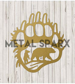 Gold metal art piece featuring a bear paw print and bear scene, by Metal Sparx, with intricate details and textured design.
