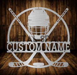 Metal Sparx hockey stick with black and white design, featuring a sleek shaft and curved blade for ice hockey gameplay.