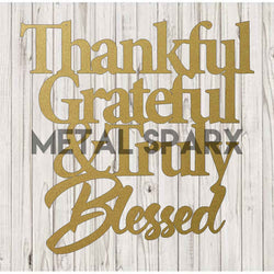 Gold metal art piece featuring the words “Thankful” and “Grateful” by Metal Sparx, decorative wall hanging with elegant script design.