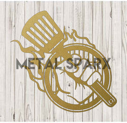 Gold Metal Sparx grill hand with a sturdy handle, designed for safely handling hot grills and barbecue accessories.