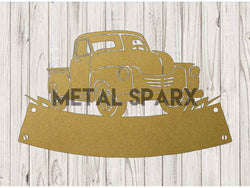 Gold metal pickup truck monogram art by Metal Sparx, decorative metal wall decor featuring a detailed pickup truck design.