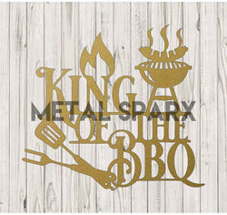 Gold King of the BBQ metal sign by Metal Sparx with bold black lettering, perfect for grilling and outdoor decor