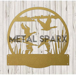 Metal Sparx geese taking flight sculpture in gold, showcasing detailed metal art of flying geese for home decor.