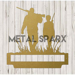 Gold-colored Father & Son Hunting sculpture by Metal Sparx, detailed metal artwork depicting a father and son outdoors.