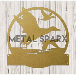 Gold Flying Geese earrings by Metal Sparx featuring geometric feather-shaped design on a white background.