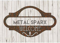 Rust metal Welcome Address Sign by Metal Sparx with vintage-style lettering on a rustic metal background.