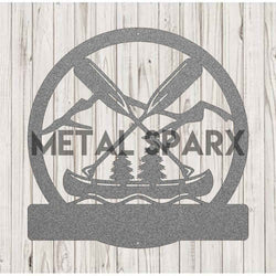 Silver metal art featuring a canoe and oars monogram design by Metal Sparx, displayed on a neutral background.