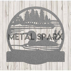 Silver metal art featuring a loon with a baby monogram by Metal Sparx, showcasing detailed bird and water design.