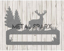 Silver Deer Address Sign by Metal Sparx with engraved numbers, mounted on a wooden post for outdoor home decor.