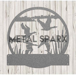 Metal Sparx geese taking flight sculpture in silver with detailed feathers and dynamic wing positions, showcasing artistic metal craftsmanship.