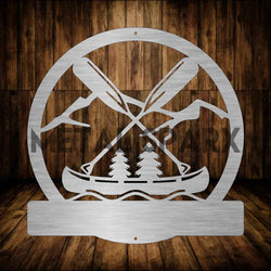 Metal Sparx Canoe & Oars Monogram metal art piece, featuring a canoe with oars design, ideal for nautical home decor.