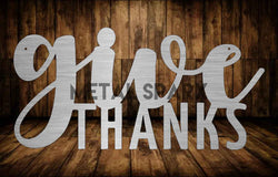 "Metal Sparx Give Thanks decorative sign with autumn leaf accents for Thanksgiving celebrations"